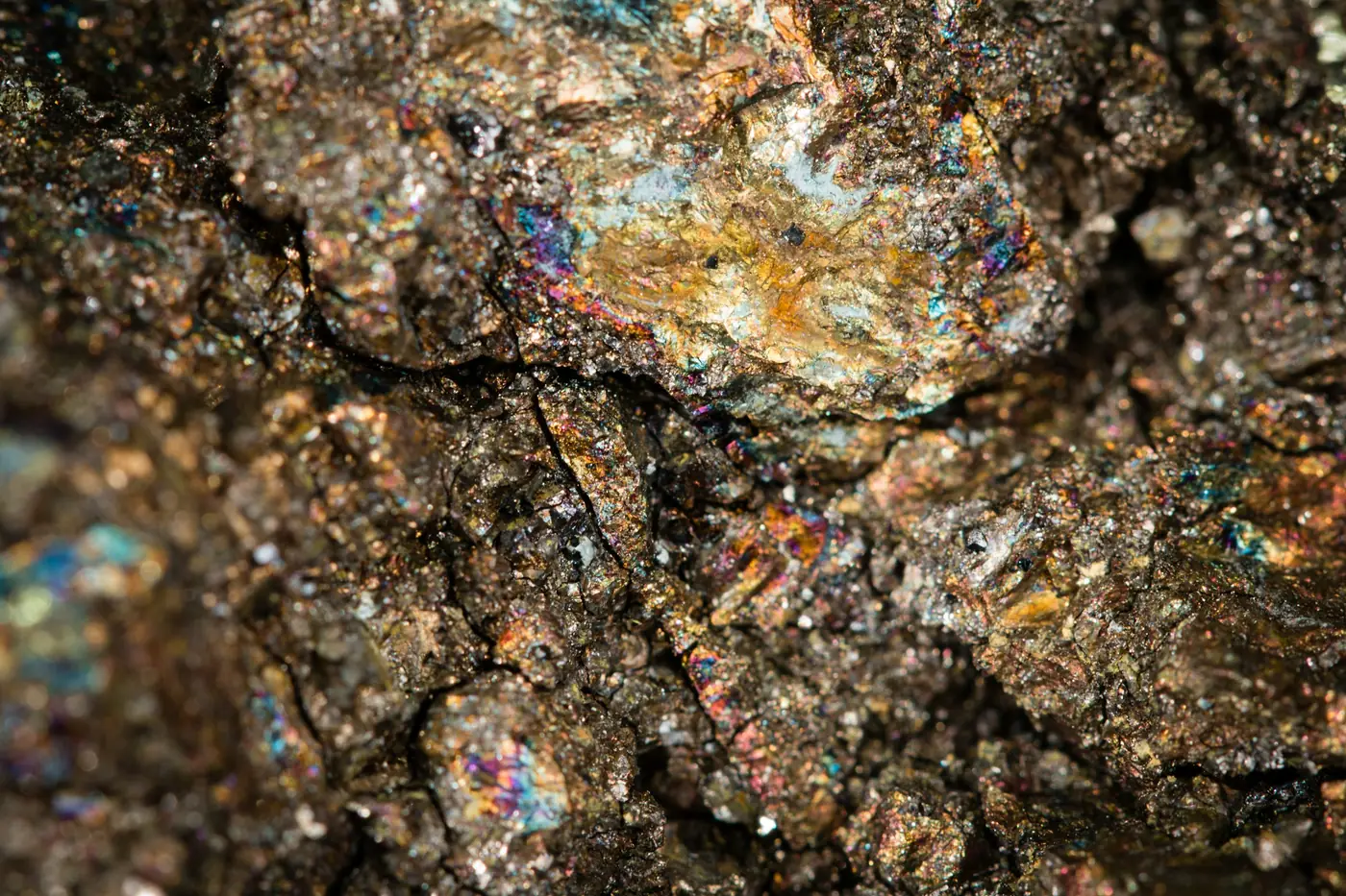 Close-up of a copper-bearing mineral with blue and bronze tones